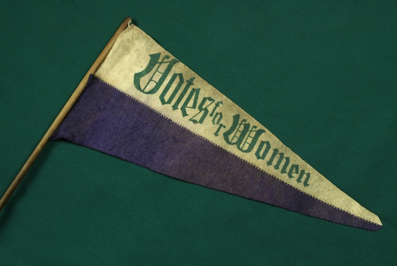 A "votes for women" pennant in the traditional suffragette colors. (Image credit: Wendy Kaveney/Creative Commons)